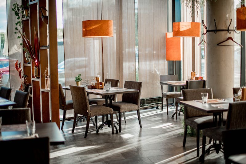 Mod Pizza interior dining area with warm lighting