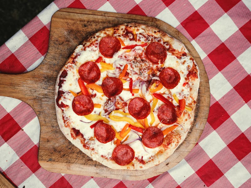 Mad Dog pizza with spicy sausage and jalapeños